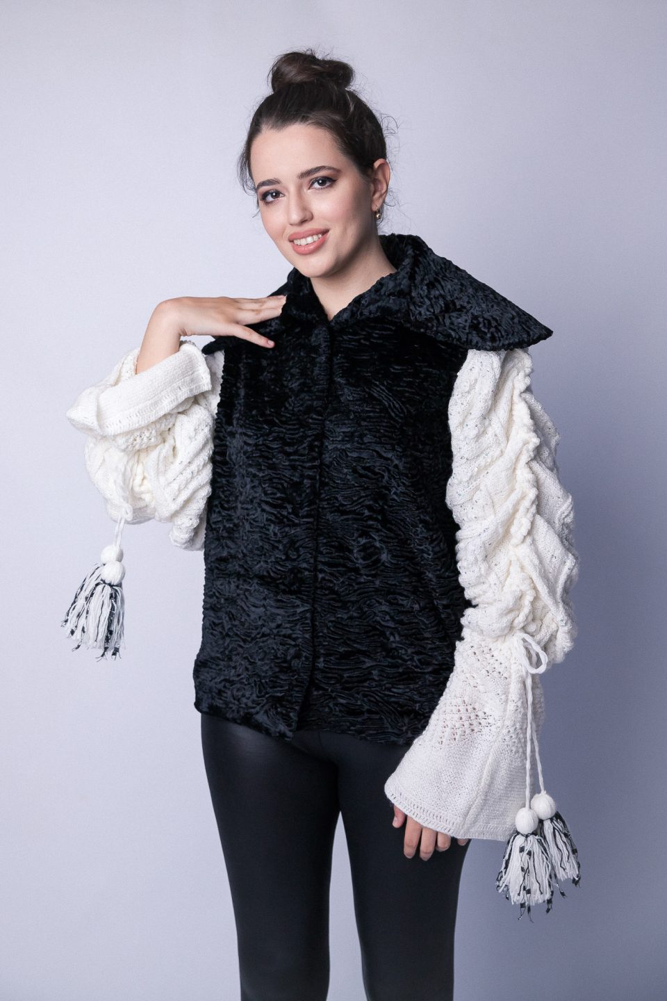 Paula - Black jacket white sleeves knitted with tassels