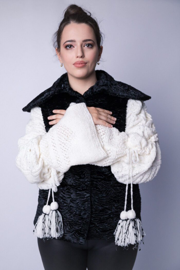 Paula - Black jacket white sleeves knitted with tassels